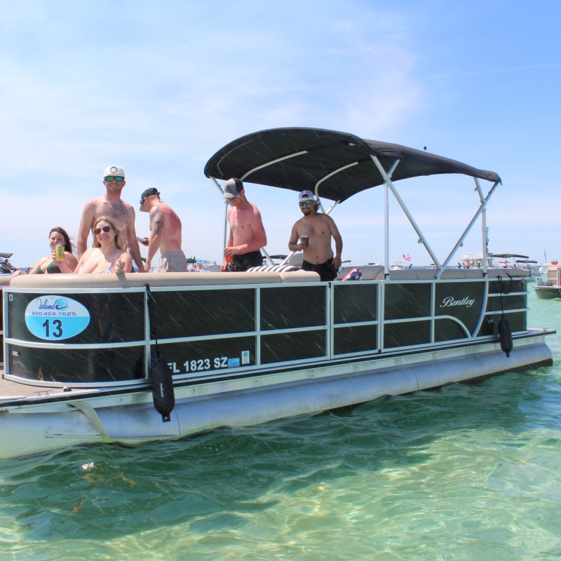 a group of people on a boat in the water