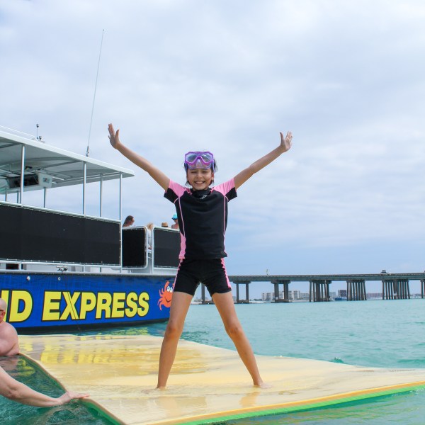 a person riding a surf board in the water